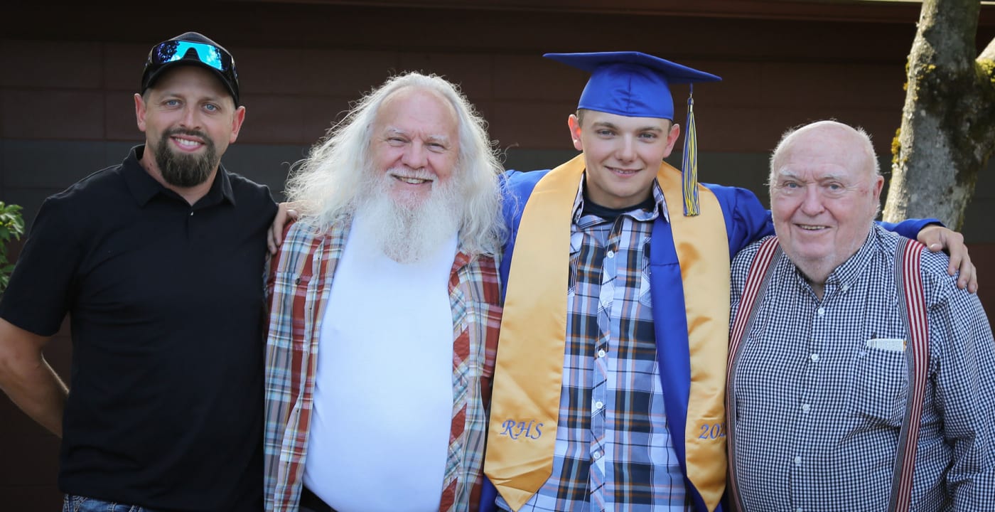 Four generations of men at high school graduation