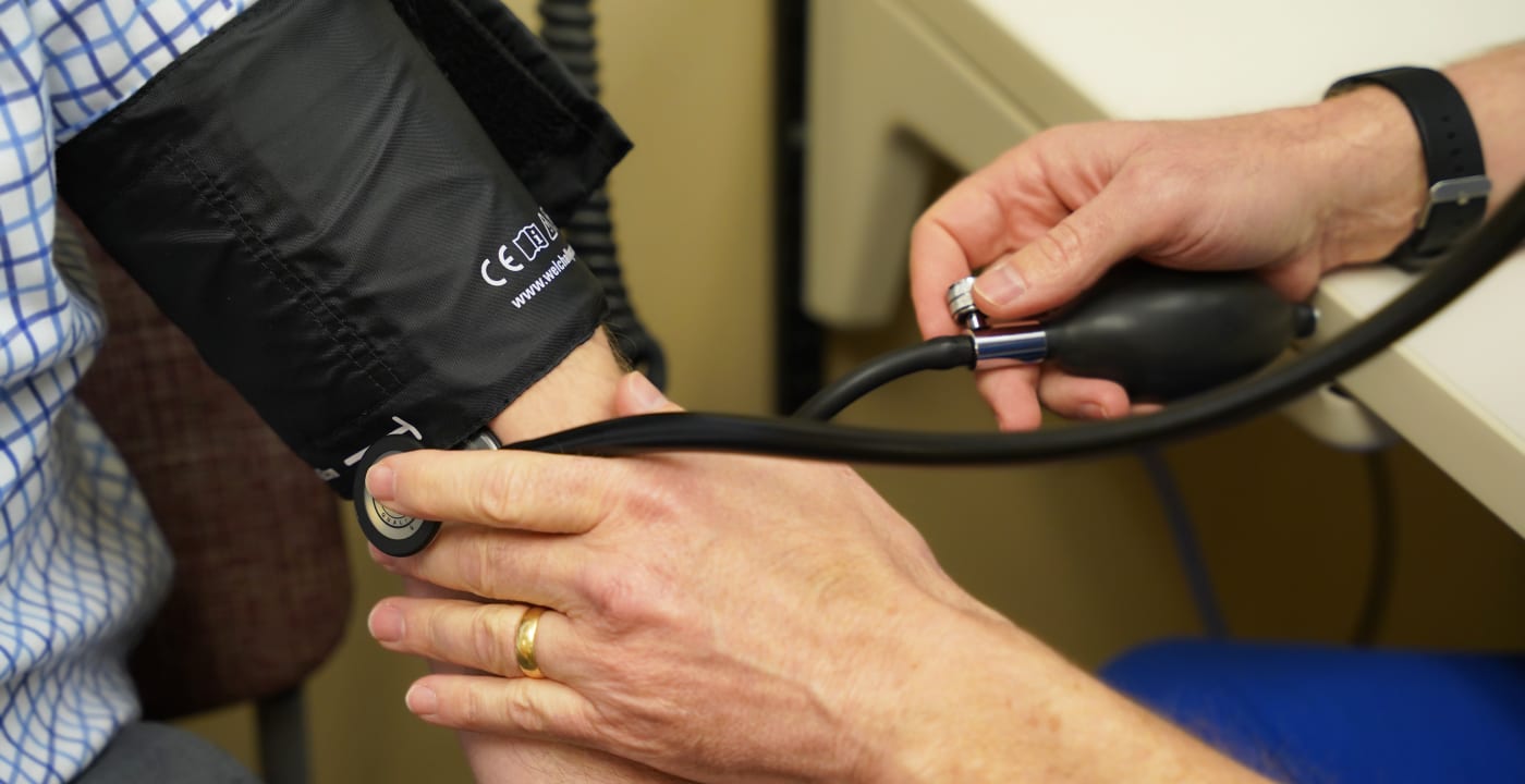 Man getting his blood pressure checked.