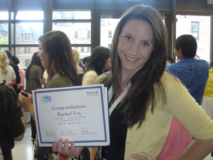 Rachel Davis holds up a certificate of completion for Nurse Camp in 2011