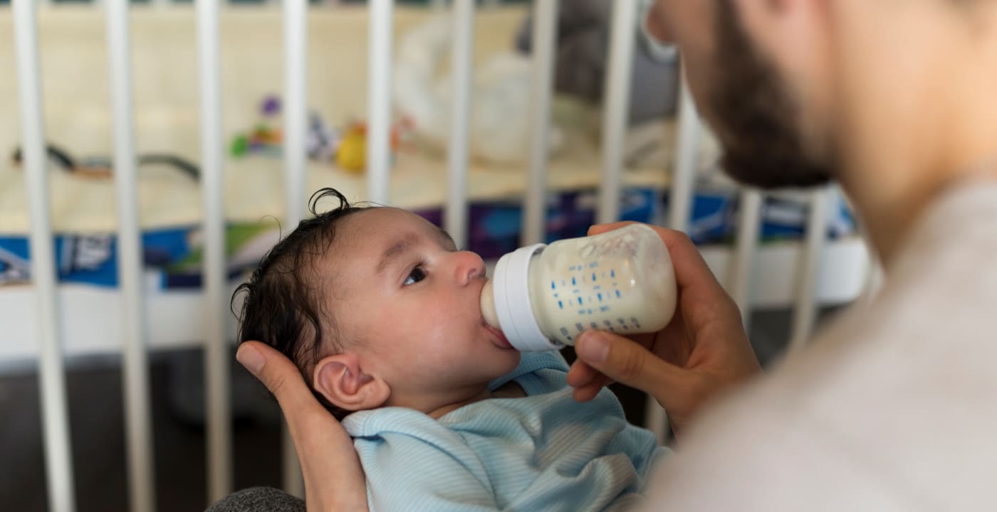 Baby drinking a bottle