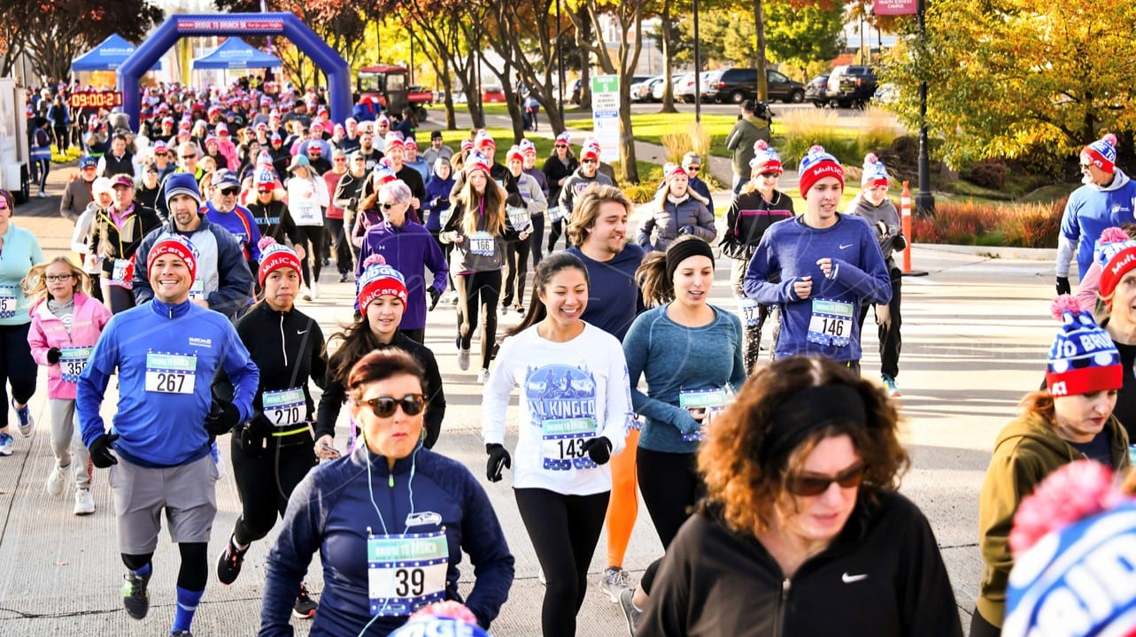 Group of people running a race.