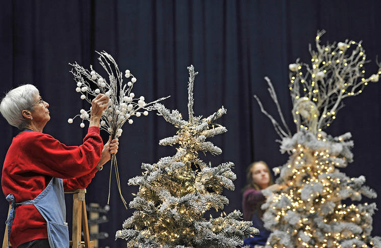 Woman decorating tree