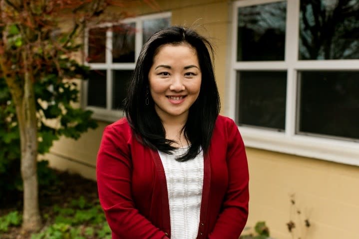 Mental health care provider smiling at camera