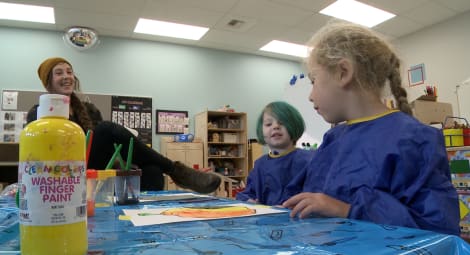 Two children in a classroom.