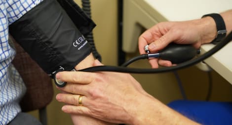 Man getting his blood pressure checked.