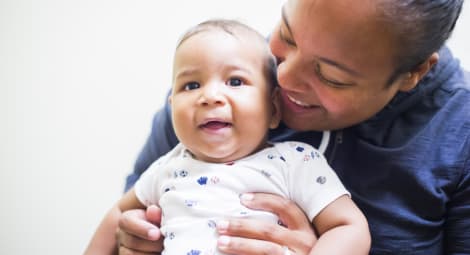 Mom and baby laughing