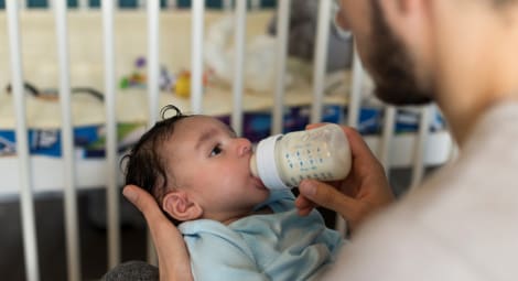 Baby drinking a bottle