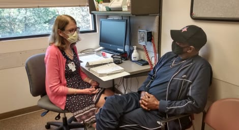 Doctor speaking to patient