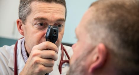 Doctor examining someone's eye