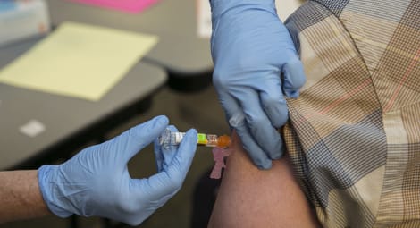 Person receiving flu vaccine