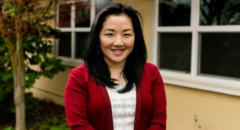 Mental health care provider smiling at camera