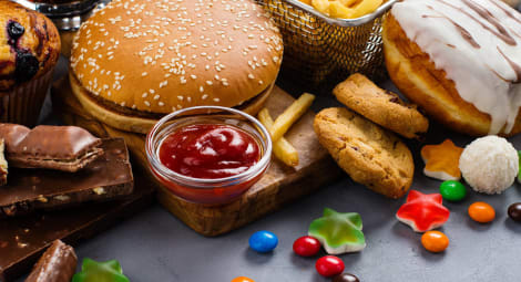 Table full of fast food and candy