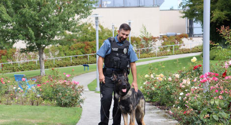 Security dog and his owner.