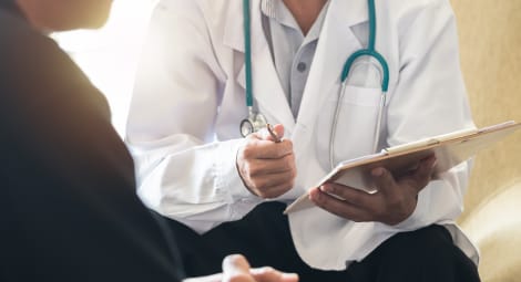 Man talking to a doctor