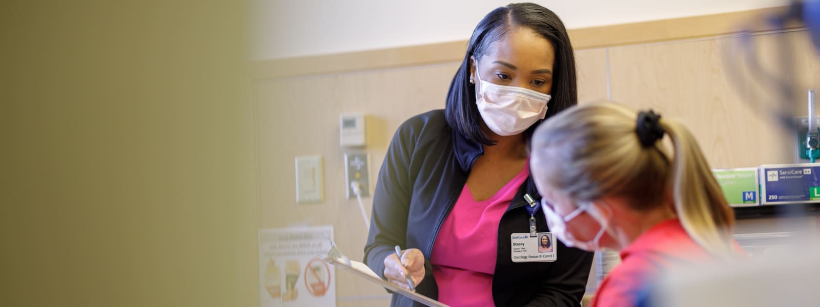 Research coordinator discusses plans with patient