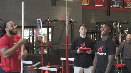 D1 Coach working with athlete