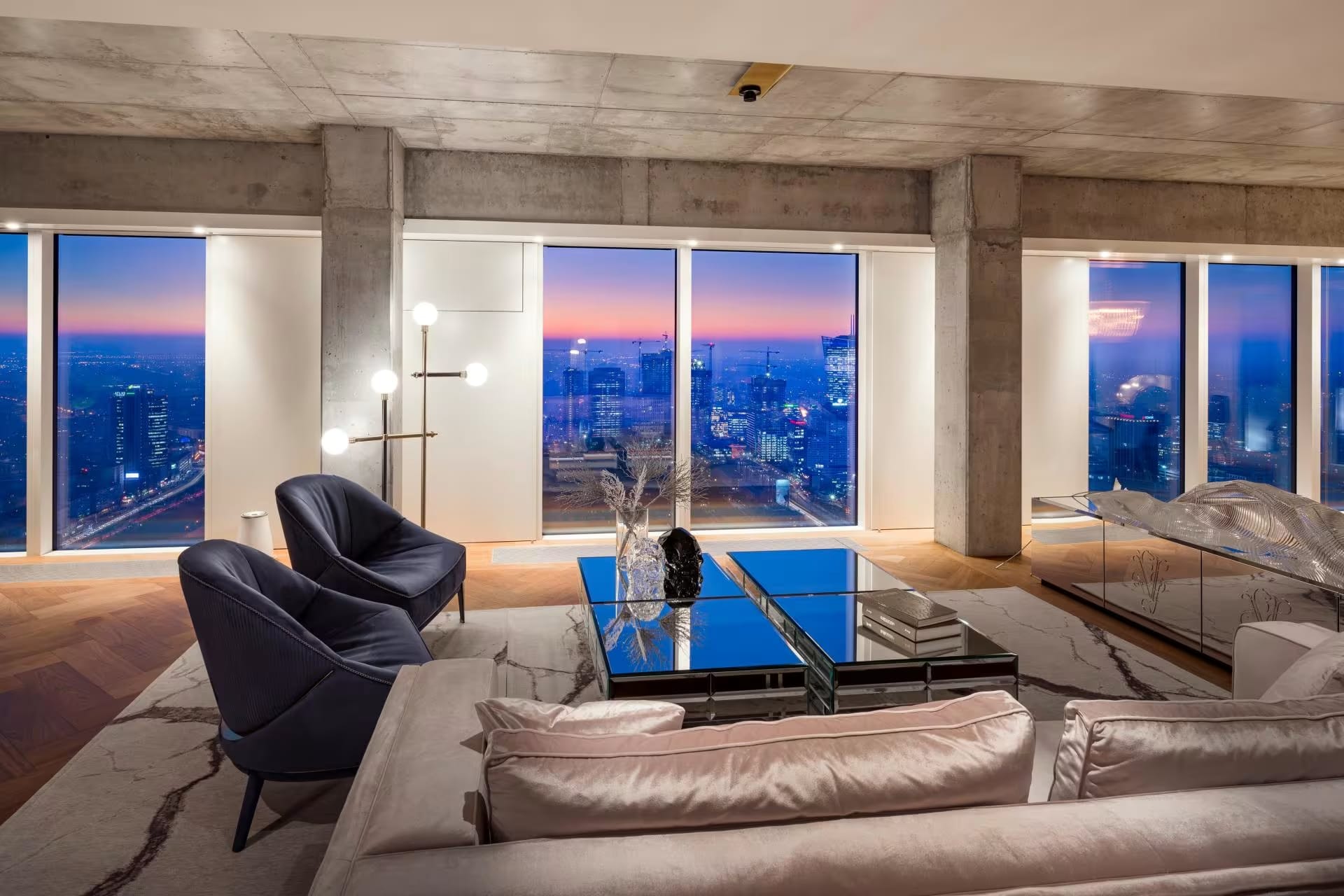 Luxury Living Room Design NYC – Custom Bespoke Furniture Luxury bespoke living room with custom-designed sofa and panoramic city views in New York.