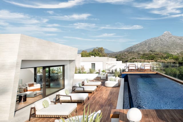 Sustainable furniture design featuring sculptural eco-friendly materials for luxury interiors.