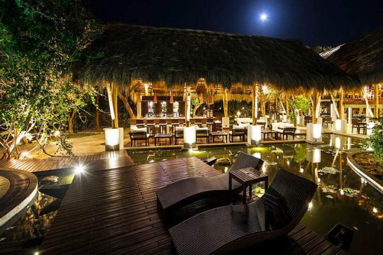 Bar and pool at night