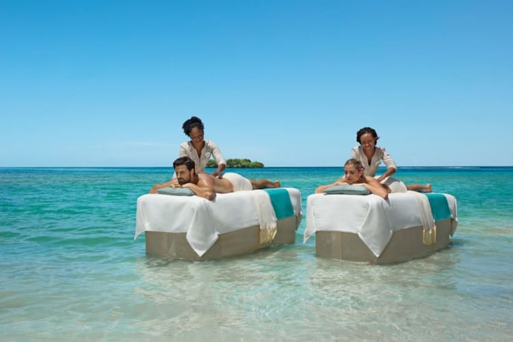 Couple’s massage by the sea