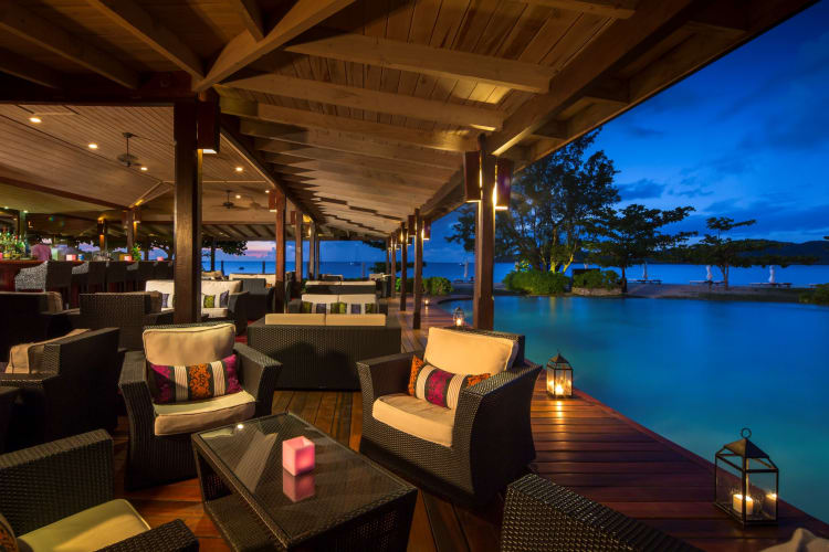 Pool lounge at Dusk Hermitage Bay