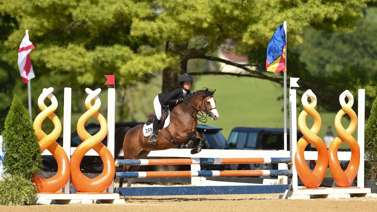 Zhou Zips To The Top In The USEF Small/Medium Pony Jumper National