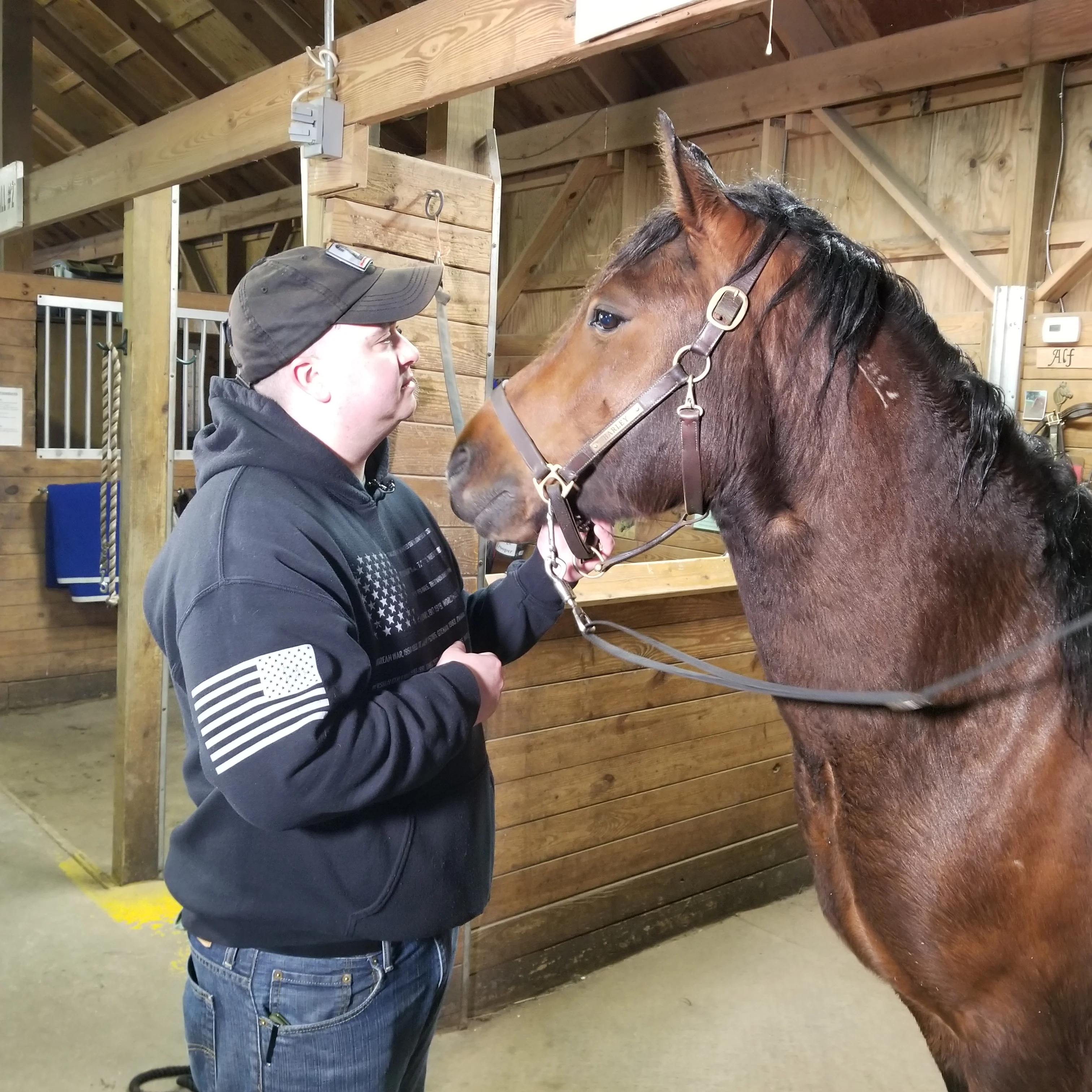 Brett Avery US Marine Corps (Ret.) with mustang Ranger