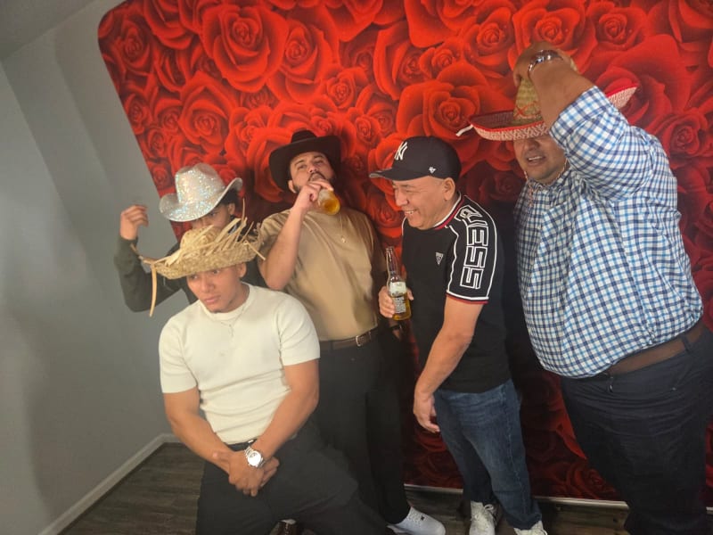 Mirror photo booth setup at adult birthday event
