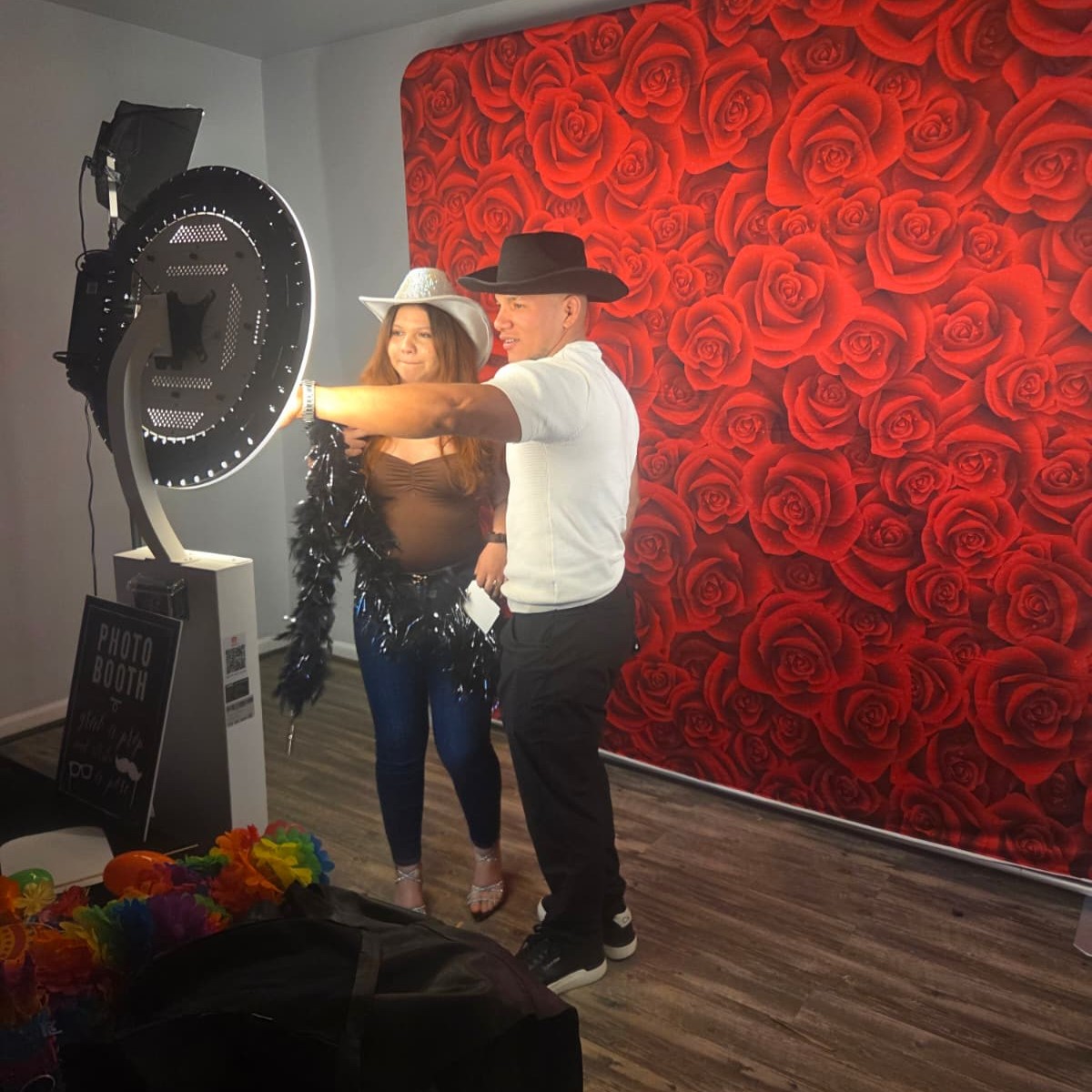 LED ring lighting the mirror photo booth at a celebration