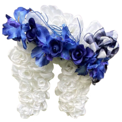 Silk flower arrangement shaped like angel wings made with blue and white flowers