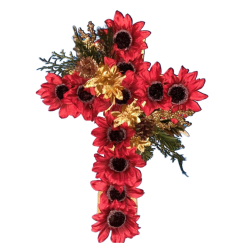 Silk flower arrangement shaped like a cross made with red flowers
