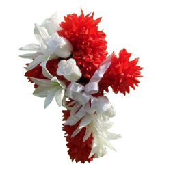 Silk flower arrangement shaped like a cross made with red and white flowers