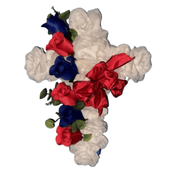 Silk flower arrangement shaped like a cross made with red and white flowers