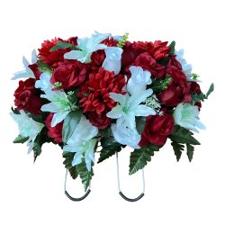 Silk flower saddle arrangement made with red and white flowers