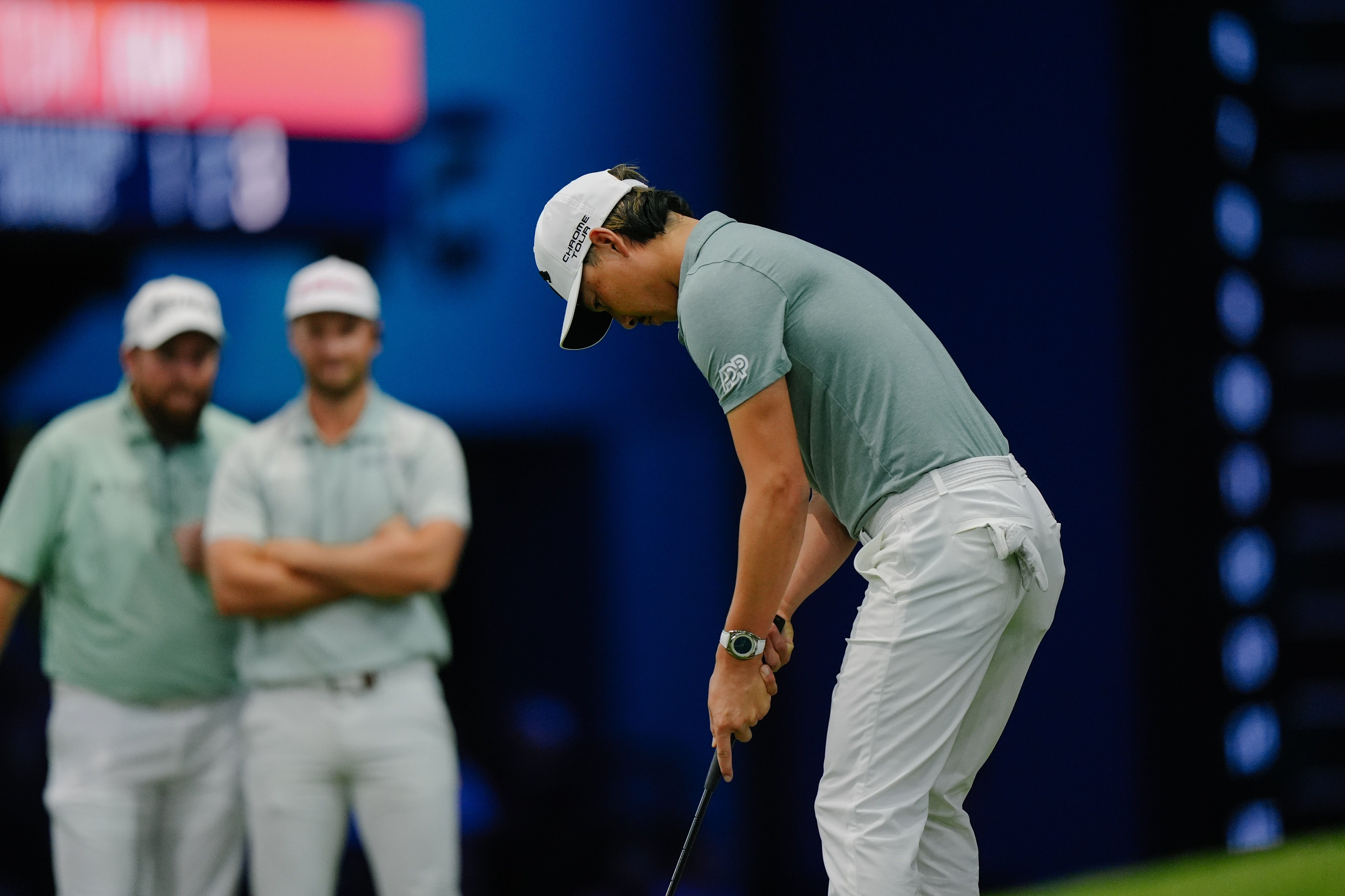 PALM BEACH GARDENS, FLORIDA - MARCH 03: Min Woo Lee of The Bay Golf Club plays a shot during their TGL presented by SoFi match against the Los Angeles Golf Club at SoFi Center on March 03, 2025 in Palm Beach Gardens, Florida. (Photo by Carmen Mandato/TGL/TGL via Getty Images)