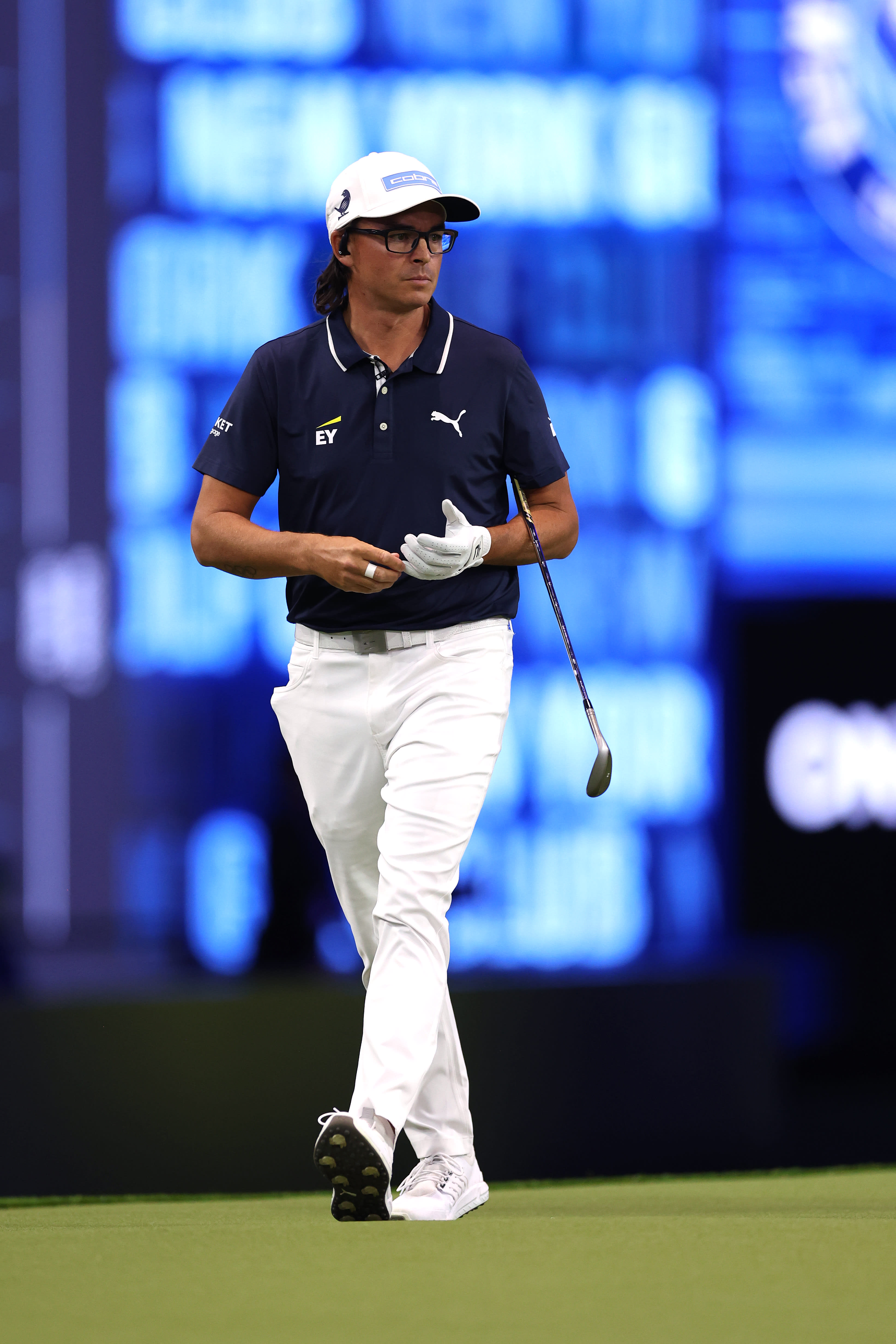 PALM BEACH GARDENS, FLORIDA - JANUARY 07: Rickie Fowler of New York Golf Club looks on from the third green during their TGL presented by SoFi match against The Bay Golf Club at SoFi Center on January 07, 2025 in Palm Beach Gardens, Florida. (Photo by Brennan Asplen/TGL/TGL Golf via Getty Images)