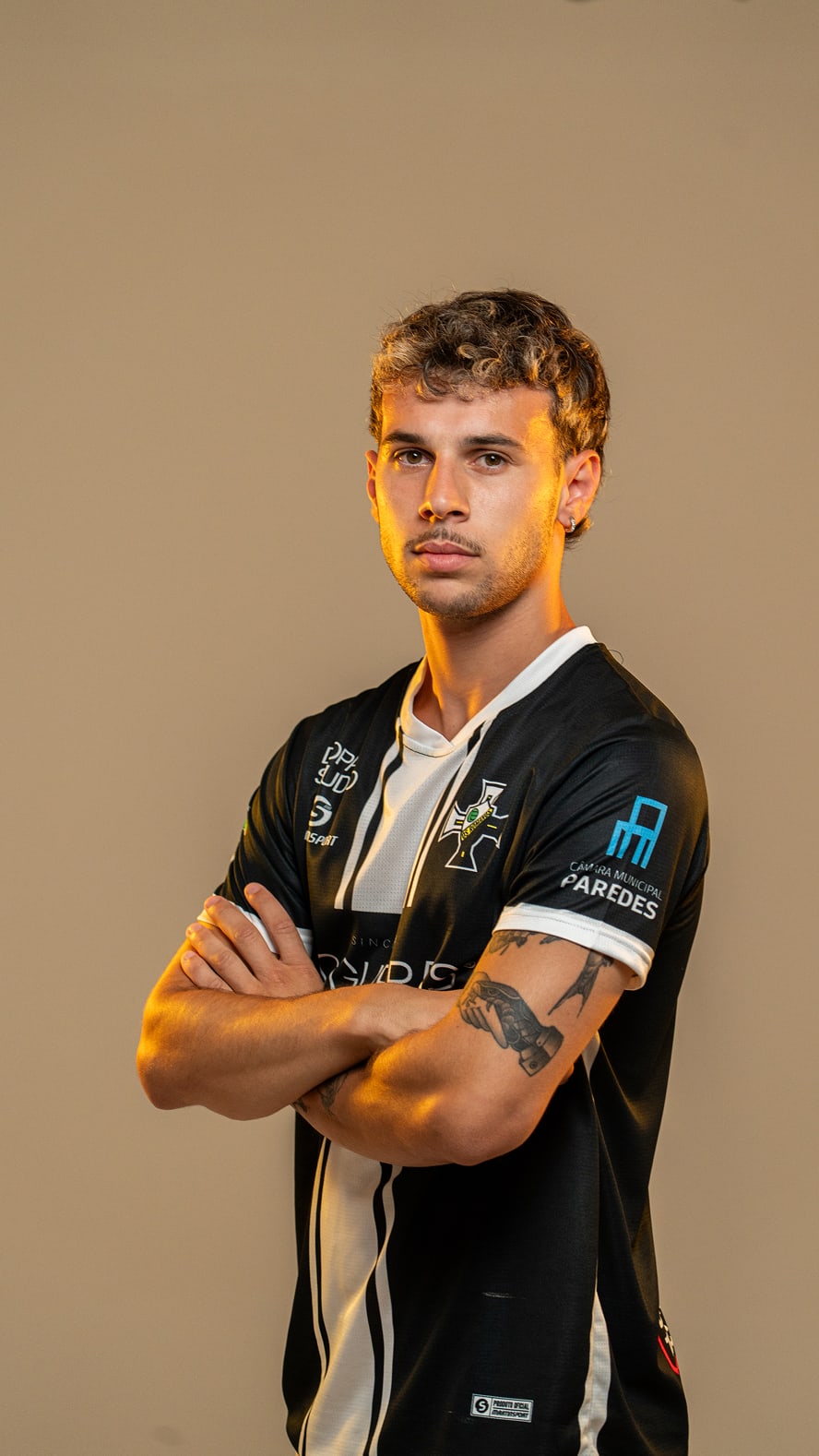 Retrato profissional em estúdio de jogador d'Os Romanos