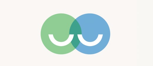 Groene en blauwe lachende emoji