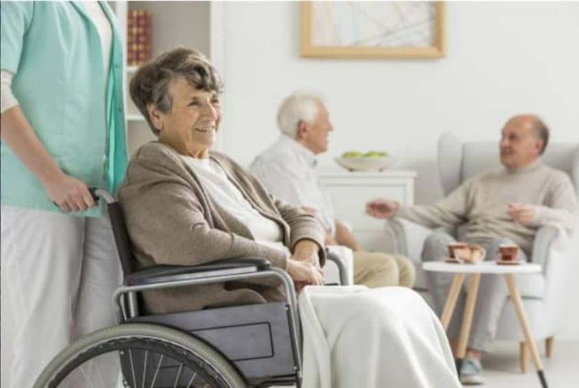 Foto van vrouw in rolstoel