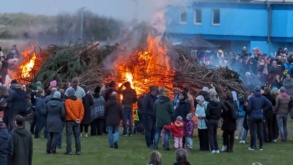 Traditional Easter bonfire at the beach meadow