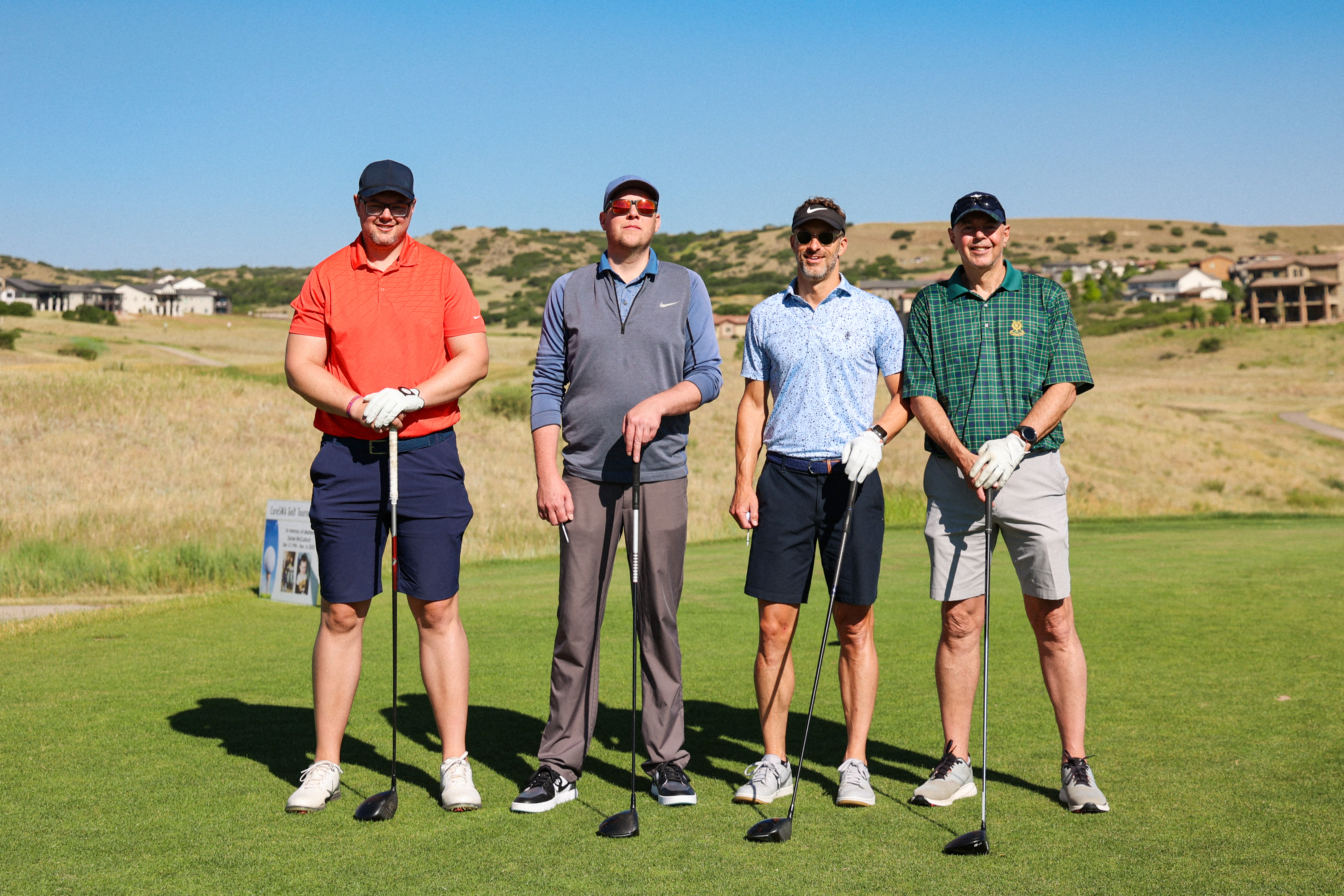 Participants together on the course at the annual Cure SMA Rocky Mountain Golf Outing