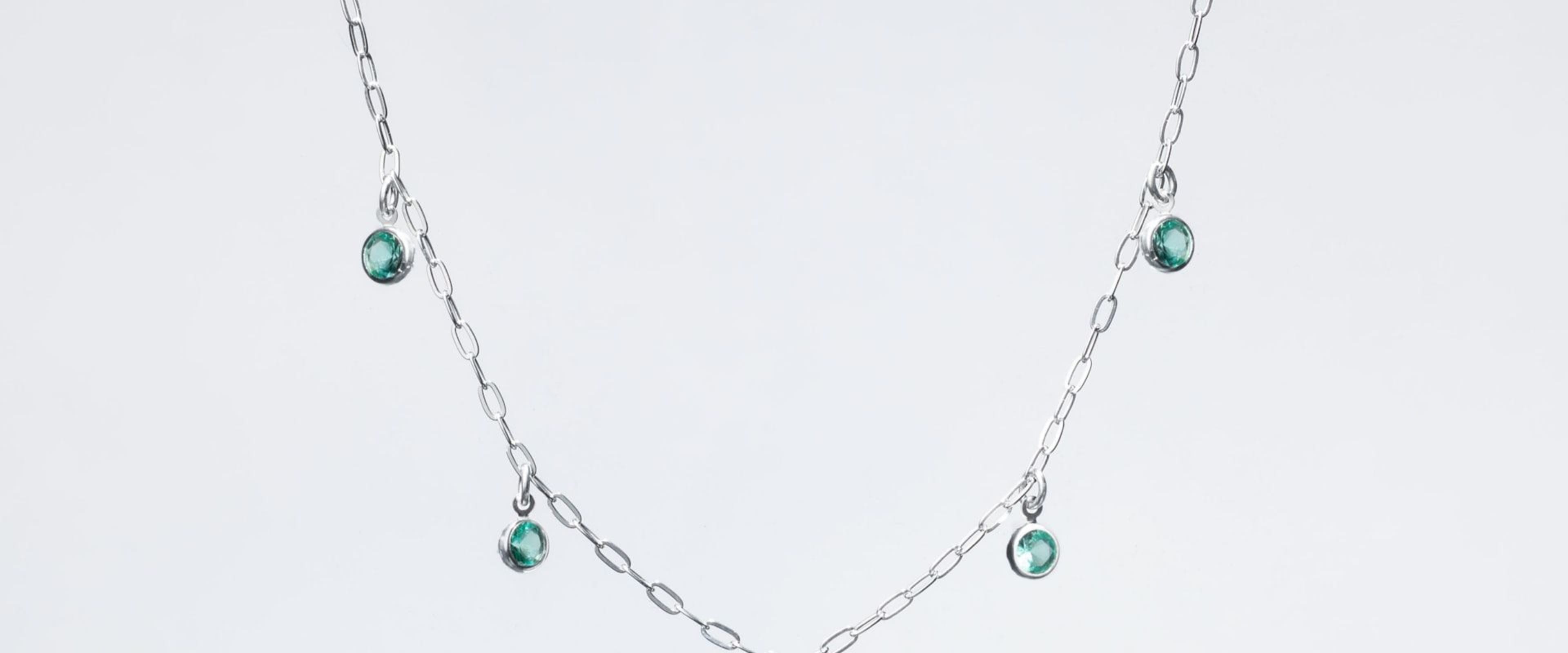 A step-cut emerald showing its garden of natural inclusions