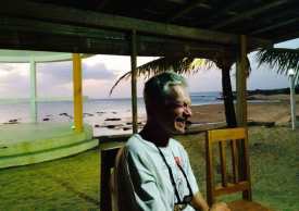 Henry Gold after a day's ride in Indonesia