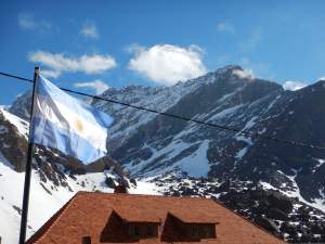 Argentina flag with massive mountains