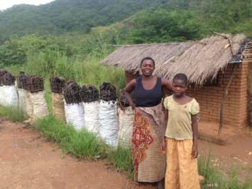 Woman selling charcoal