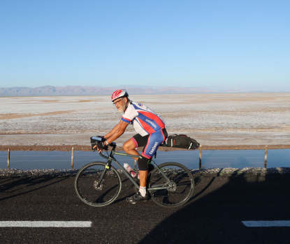 Klaus-riding-on-a-landscape-of-salt-and-sand