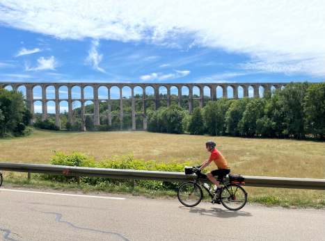 Grant Duncan riding by Chaumont's train bridge, France