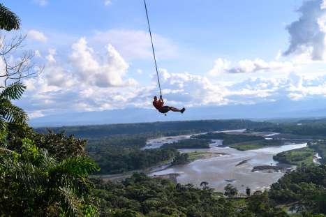 A World Of Change - Experiencing South America's Dynamic Environments On Two Wheels Nick soaring above the Amazon in Ecuador