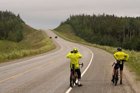 Tales From The Alaska Highway Riders-stop-to-take-photos-of-bison-on-the-Alaska-Highway-in-British-Columbia.