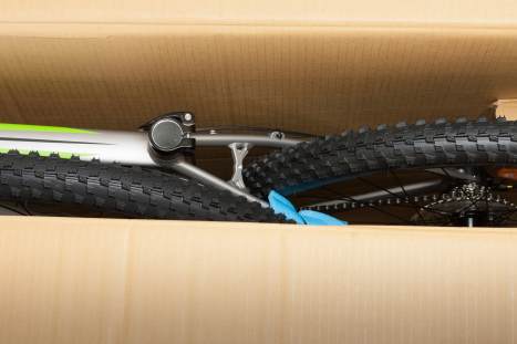 Bike in paper box, photo from unboxing bike